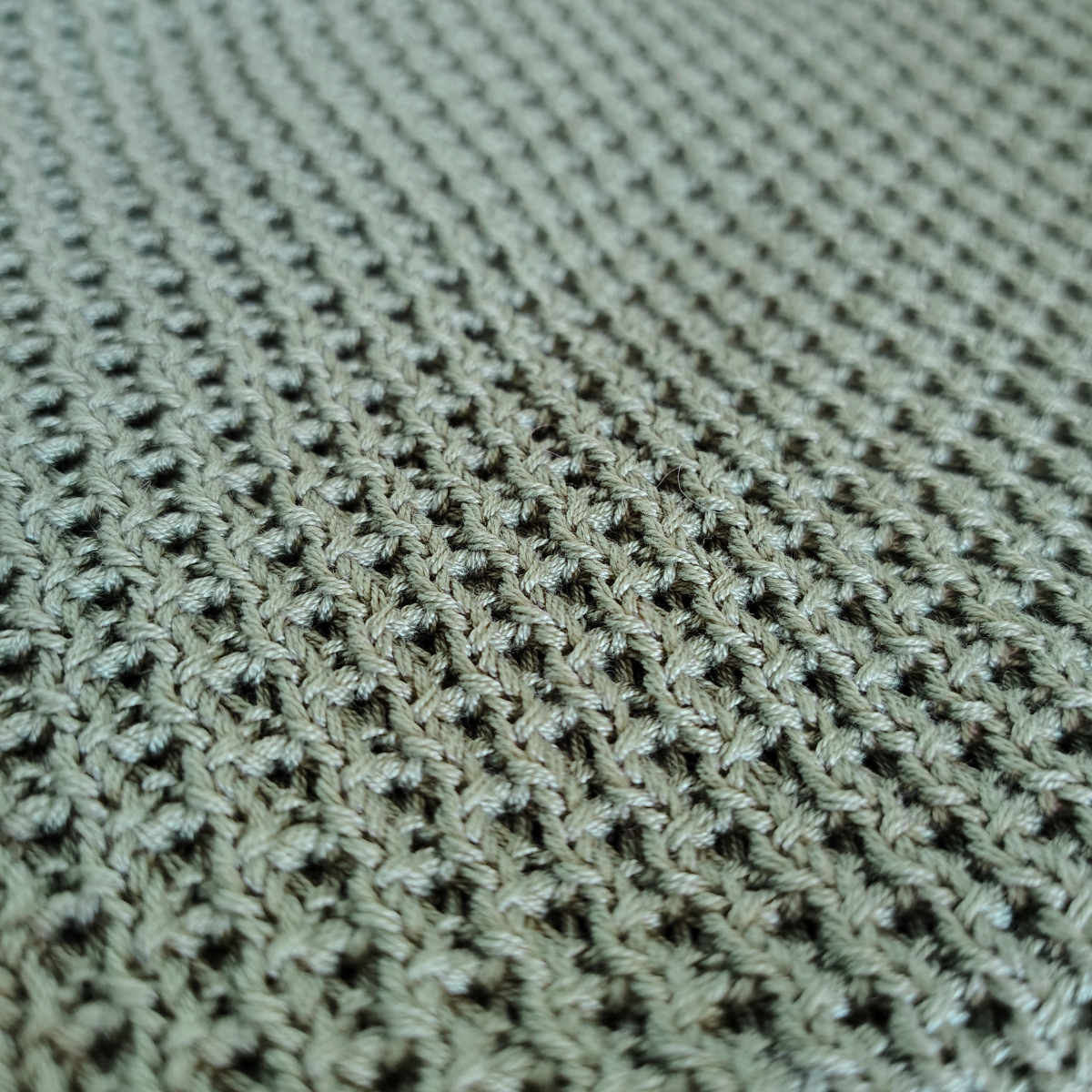 Detailaufnahme Strickmuster einer in Kärnten gestrickten Babydecke aus Baumwolle